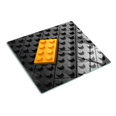 Staklena daska za rezanje LEGO kockice na crnoj pozadini
