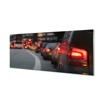 Fotografija na akrilnom staklu Automobilska gužva osvjetljava gradsku ulicu