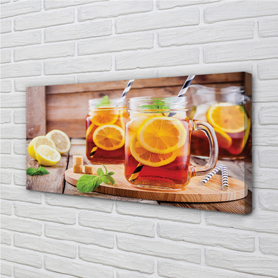 Foto slika na platnu Hladan čaj sa slamkama citrusa