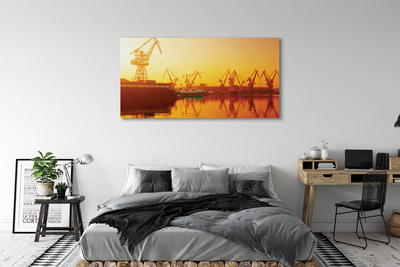 Slika canvas Izlazak sunca u brodogradilištu Gdańsk
