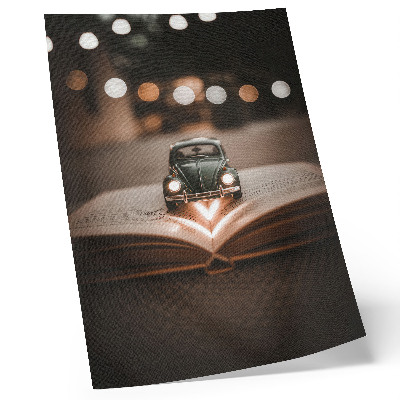 Dekorativni plakat Minijaturni automobil na knjizi s čarobnim svjetlima