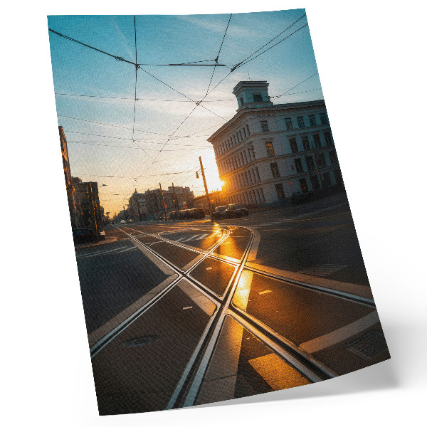 Plakat Zalazeće sunce nad gradom s arhitekturom