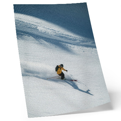 Plakat Skijaš žuta jakna snijeg padina sjena