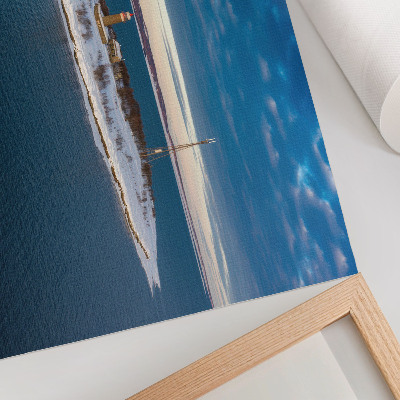 Plakat na platnu Zimski otok sa svjetionikom i plavim morem