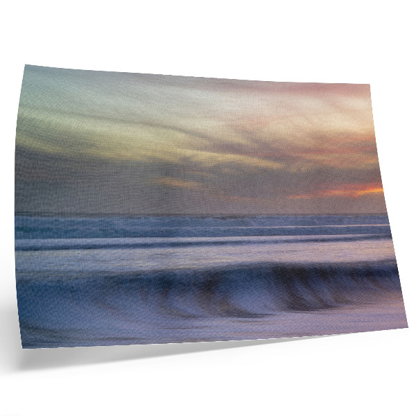 Plakat na platnu Pastelni oceanski valovi i zalazeće sunce
