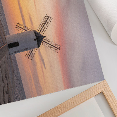 Plakat na platnu Vjetrenjača u svjetlu zalaska sunca, more, pastelno nebo