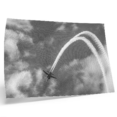 Umjetnički print Avion na nebu s dinamičnim prugama oblaka