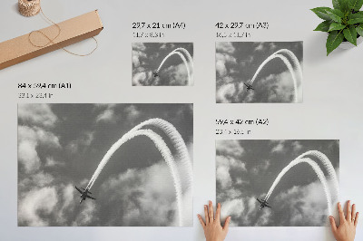Umjetnički print Avion na nebu s dinamičnim prugama oblaka