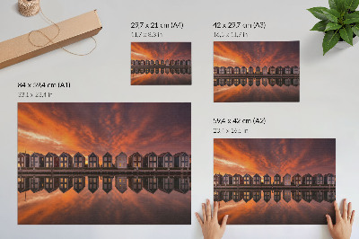 Plakat Šarene kuće uz vodu u svjetlu zalaska sunca
