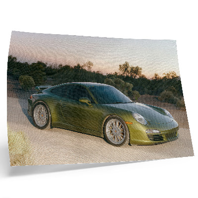 Stilski zidni plakat Sportski automobil zeleni pustinjski zalazak sunca