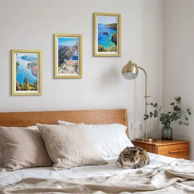 Pogled na grčko more i grad Oia na Santoriniju set od 3 slike u okviru