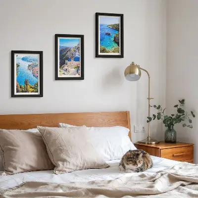 Pogled na grčko more i grad Oia na Santoriniju set od 3 slike u okviru