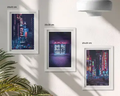 Zidna galerija slika noćni grad s neonskim svjetlima i ulazom u kino