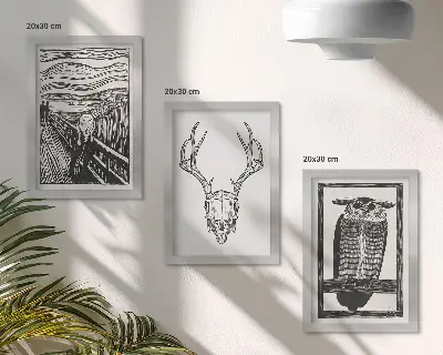Zidna galerija slika nadahnuta motivom lubanje i sove u grafičkom stilu
