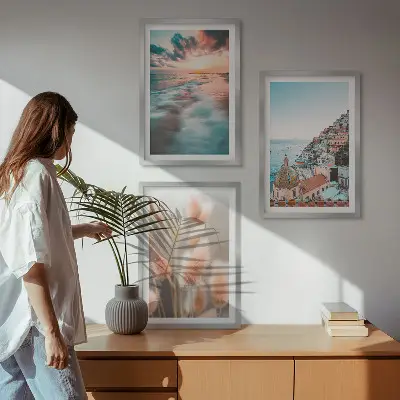 Triptih Kuće s cvijećem u zalasku sunca na moru u okviru