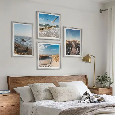 Set od 4 slike u okviru motiv plaže s valovima, nebom i šetnicom uz mol