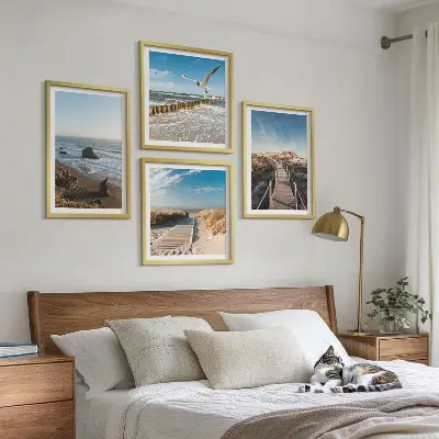 Set od 4 slike u okviru motiv plaže s valovima, nebom i šetnicom uz mol