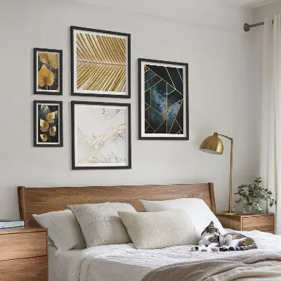 Set slika za zid iznad kauča elegantno lišće i geometrijski uzorci