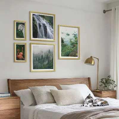 Set slika iznad kauča s motivima prirode, divljih životinja i krajolika