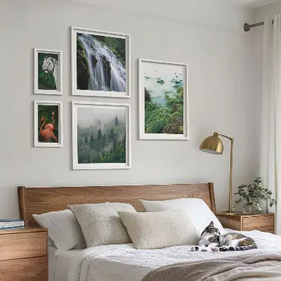 Set slika iznad kauča s motivima prirode, divljih životinja i krajolika